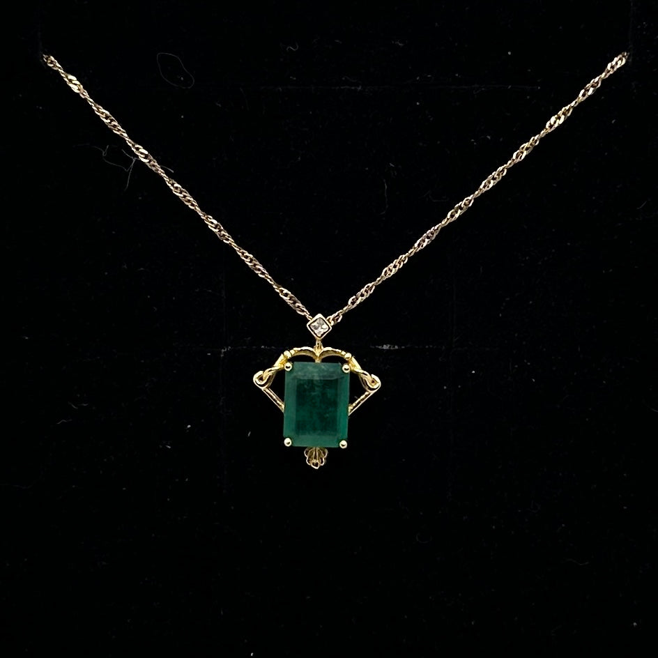 Natural emerald pendant - bow and arrow