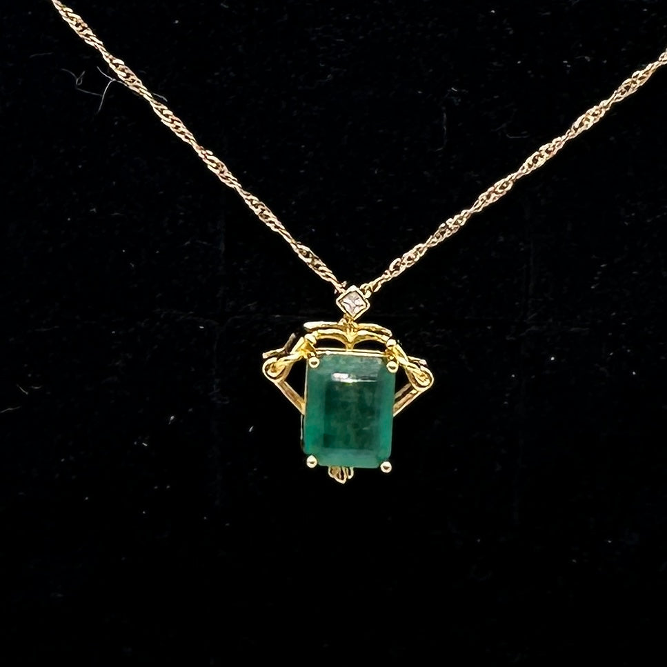 Natural emerald pendant - bow and arrow