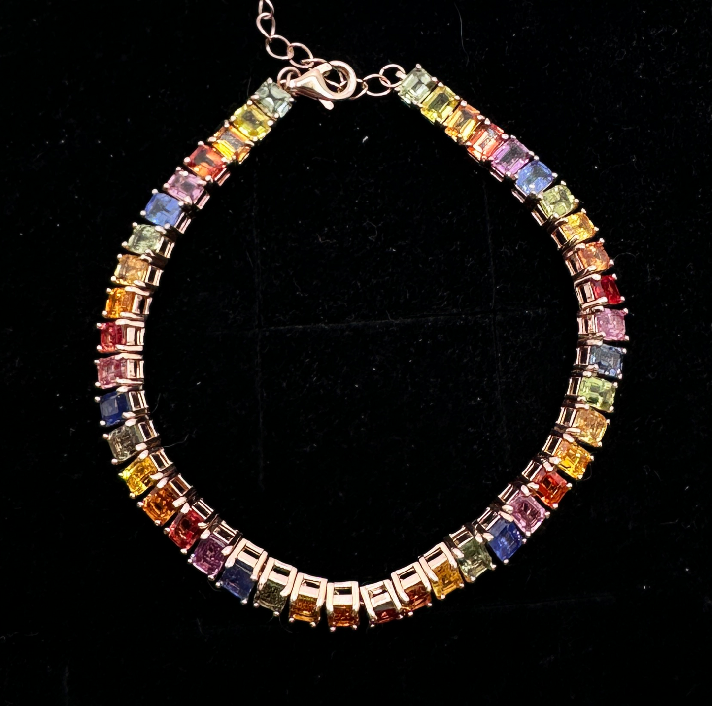 Emerald cut rainbow sapphire tennis bracelet