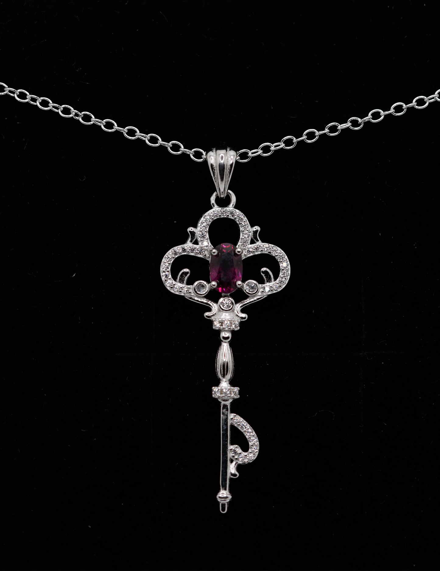 Rhodolite garnet key pendant