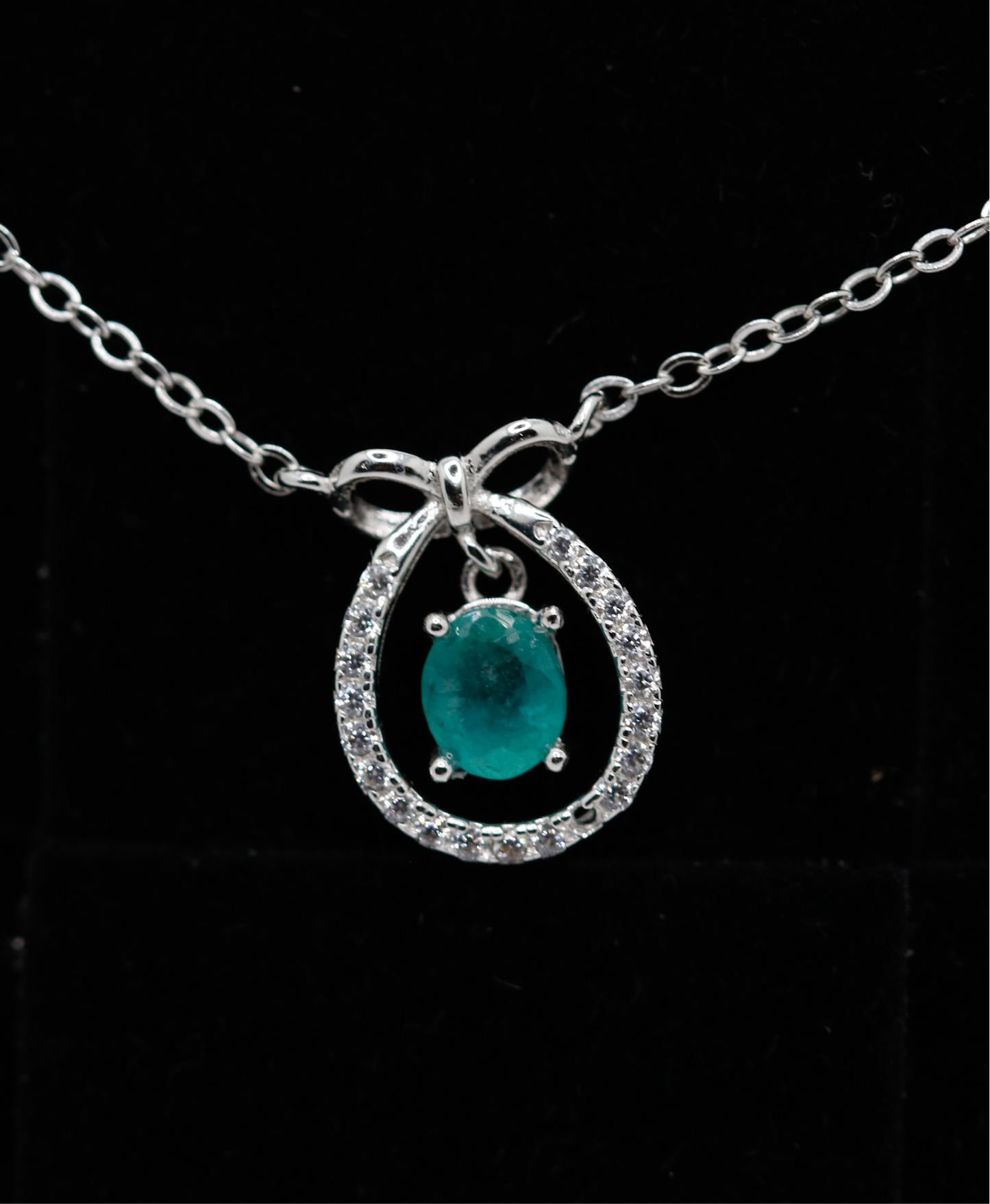 Bows please emerald drop necklace