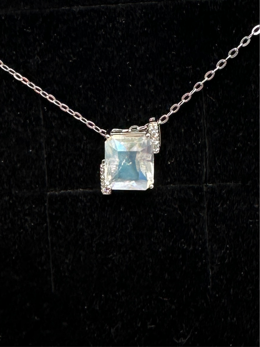 Rainbow moonstone solitaire pendant