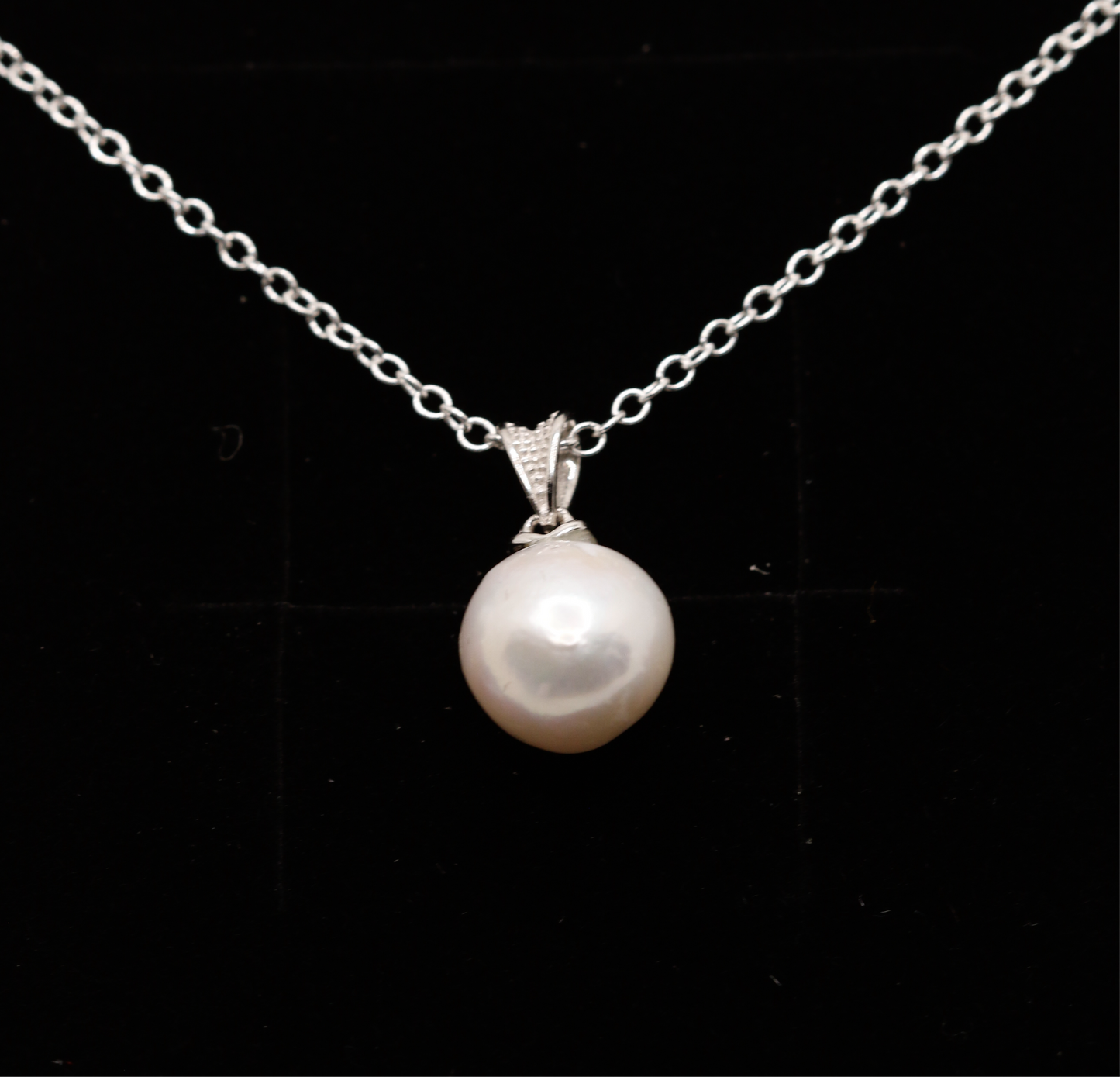 Simplicity pearl charm
