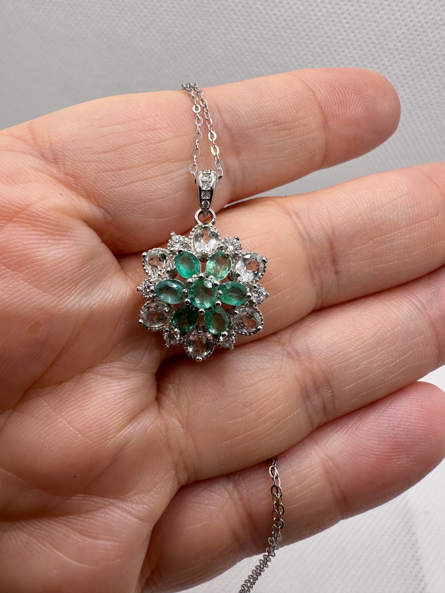 Emerald & white topaz sunburst