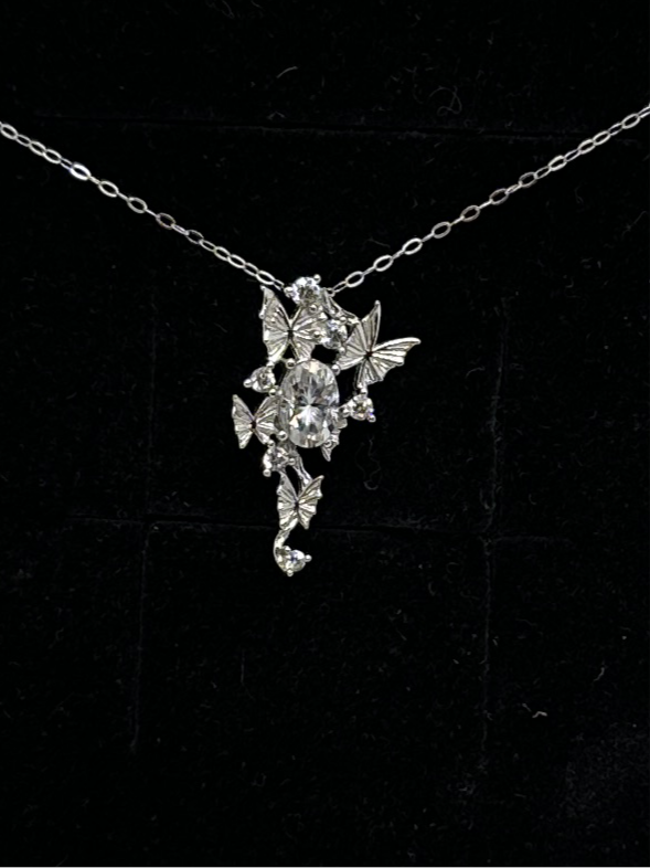 Sparkling moissanite butterfly pendant