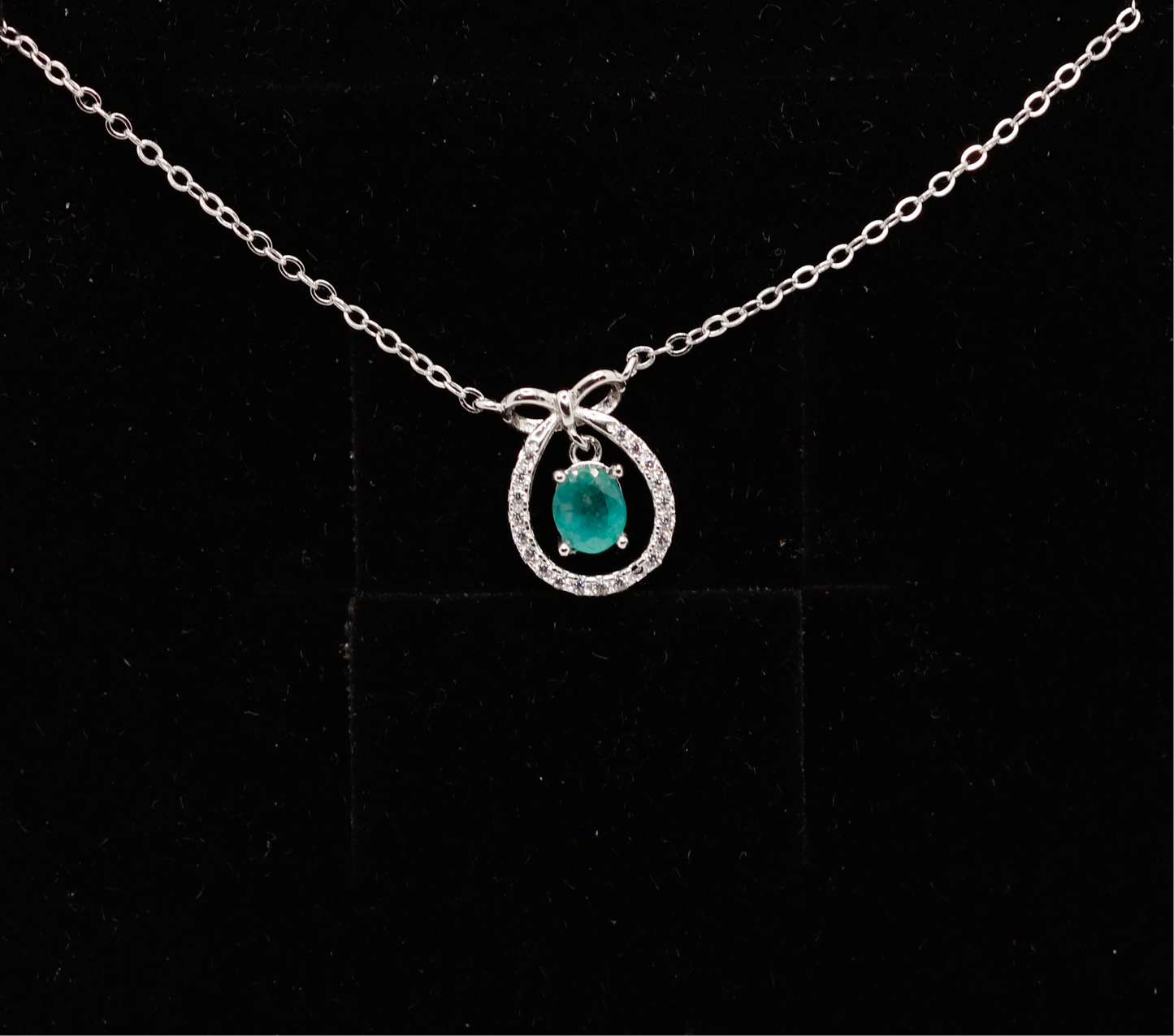Bows please emerald drop necklace