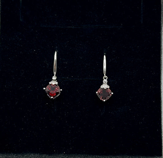 Princess garnet dangle earrings