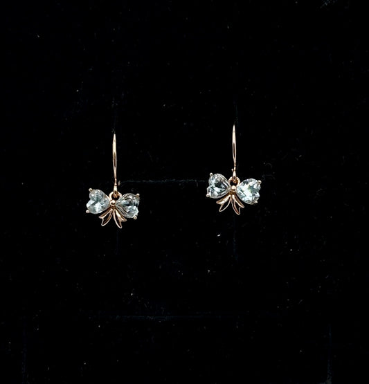 Aquamarine bow huggie earrings
