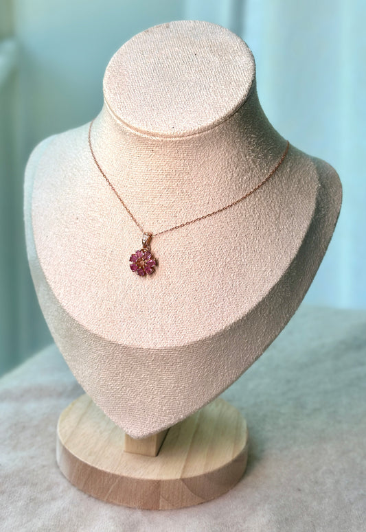 Petite pink sapphire flower pendant